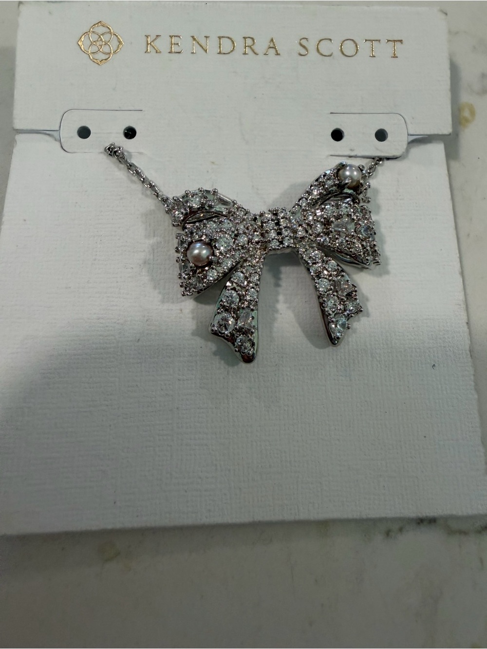 Kendra Scott Silver Crystal Bow Necklace with Pearl Accents